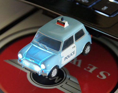 "Police Car" Mini Cooper headlights turns on when plugged into a laptop's USB port.