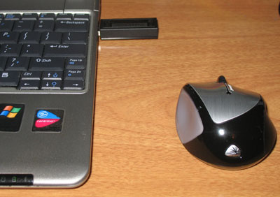 The wireless receiver will connect with the mouse from up to 30 feet away.