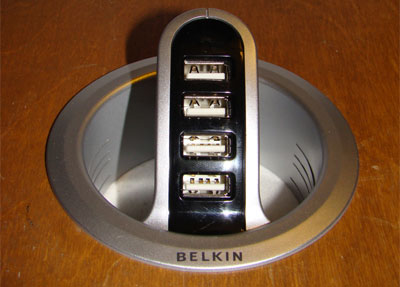 Belkin 4-port USB hub fits snugly in a desktop's grommet hole.